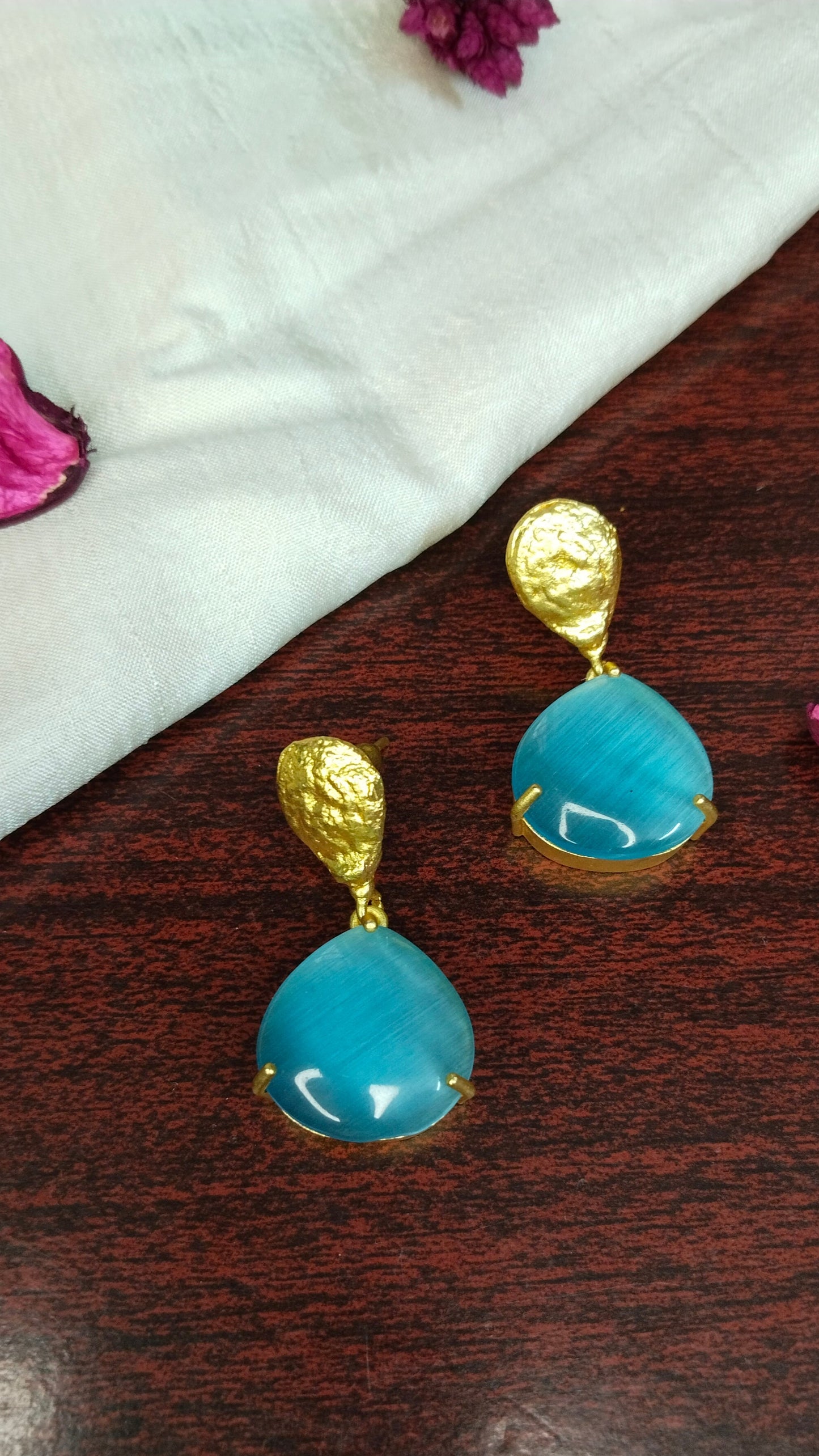 aval aabarana ,best fashion jewellery brand, brass earrings, sky blue earrings