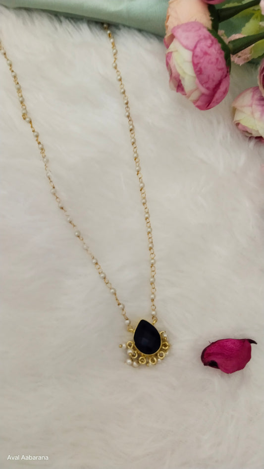 royal blue Crystal stone petal pendant adorned with pearl chain