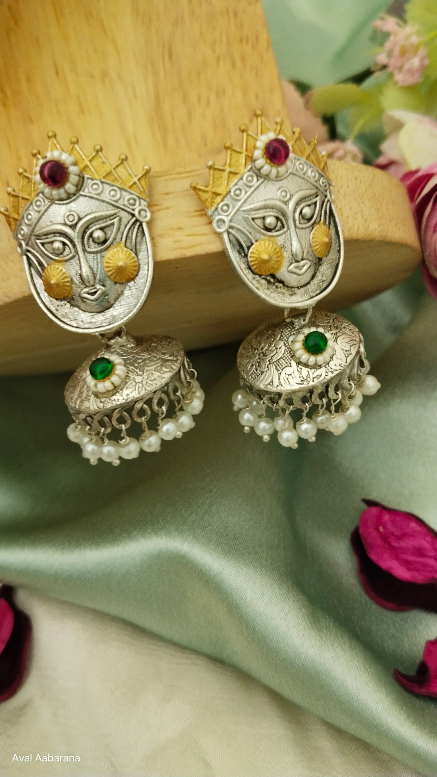Silver replica goddess face earring