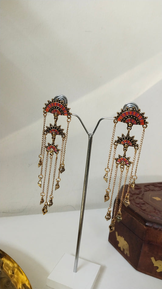 Orange enameled dangler earring
