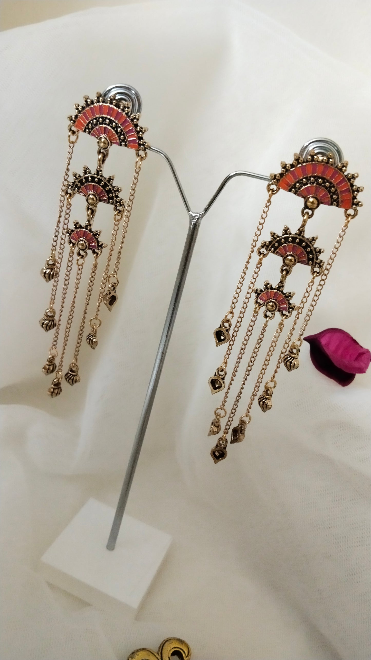 Orange enameled dangler earring