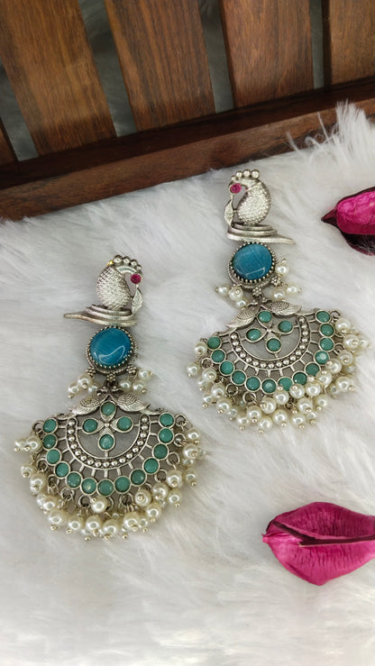 Beautiful Silver Replica peacock blue & magenta earrings