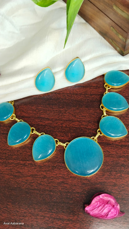 Sky blue monalisa stone petal shaped necklace set with earrings (sky bue & Red)