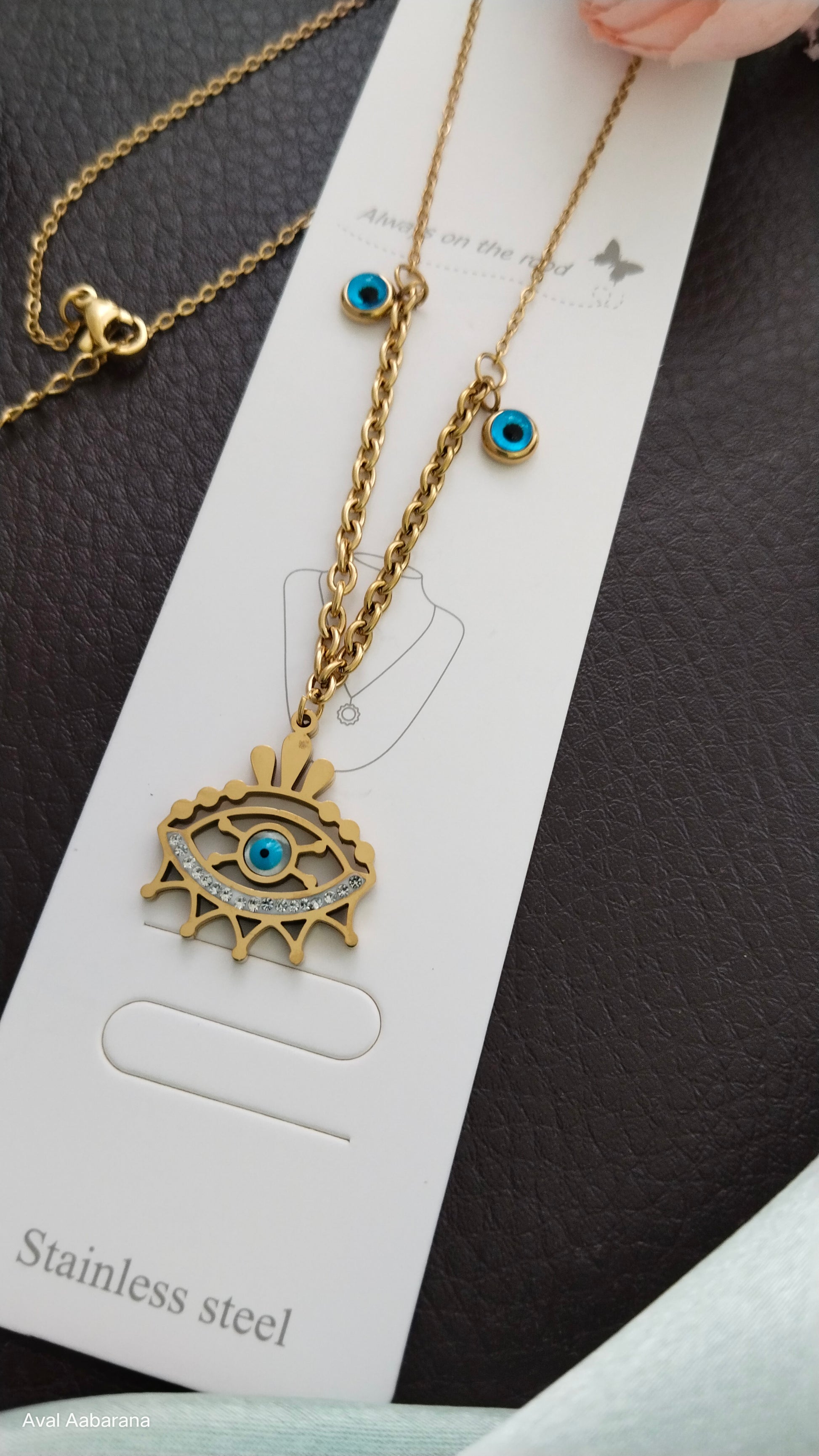 aval aabarana ,best fashion jewellery brand, brass earrings, staineless steel anti tarnish evil eye pendant chain
