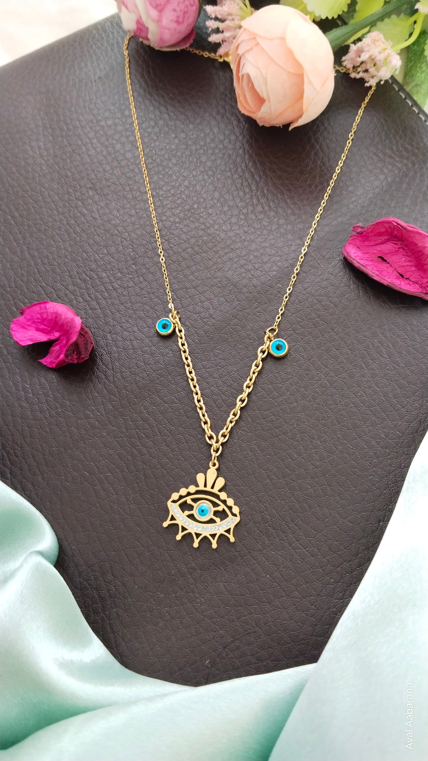 aval aabarana ,best fashion jewellery brand, brass earrings, staineless steel anti tarnish evil eye pendant chain
