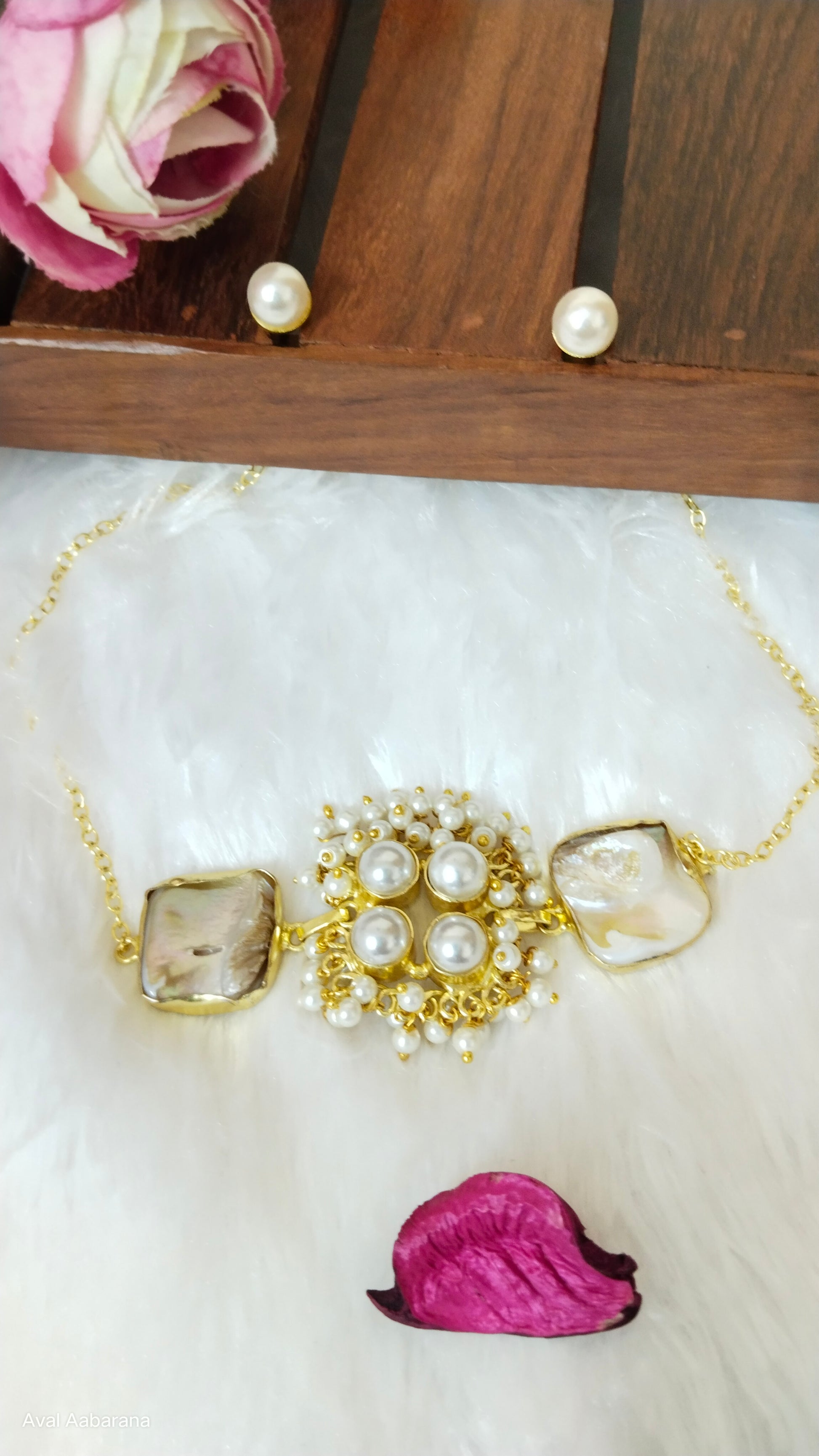 Cute mother of pearl choker,
aval aabarana ,best fashion jewellery brand, brass earrings