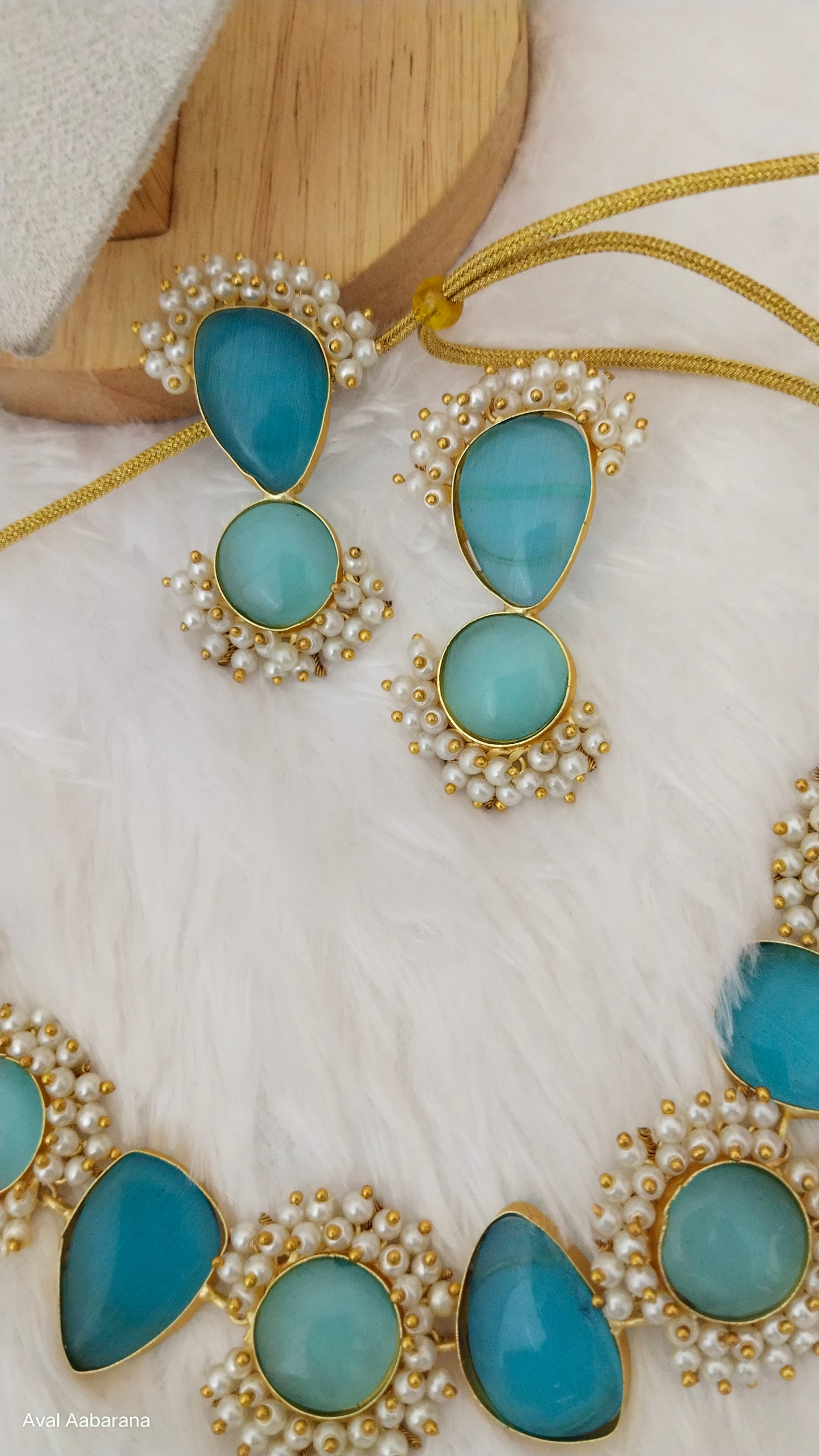 Teal blue monalisa Stone Brass necklace set adorned with pearl