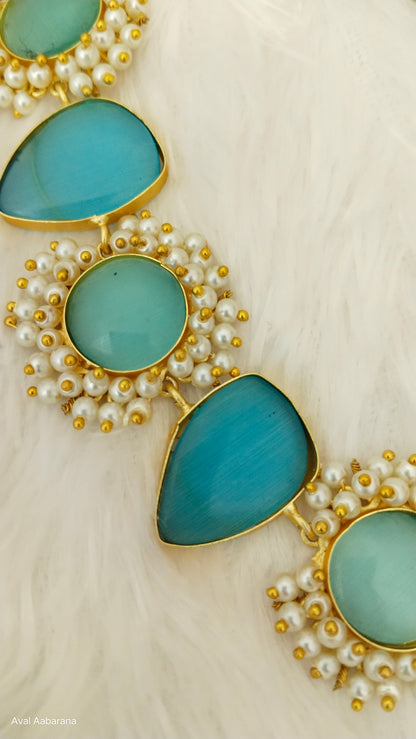 Teal blue monalisa Stone Brass necklace set adorned with pearl