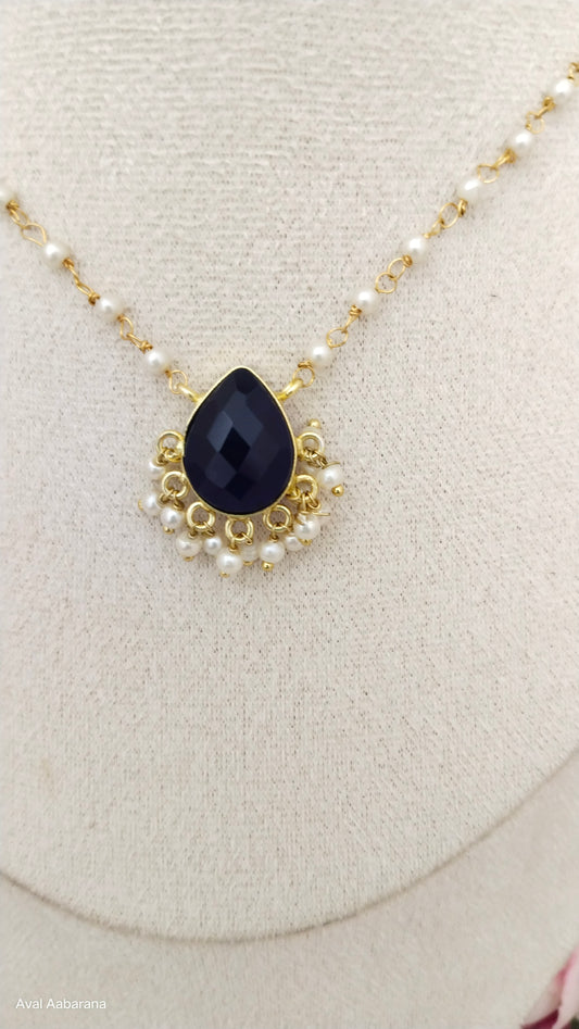 Crystal stone petal pendant adorned with pearl chain,aval aabarana ,best fashion jewellery brand, brass earrings