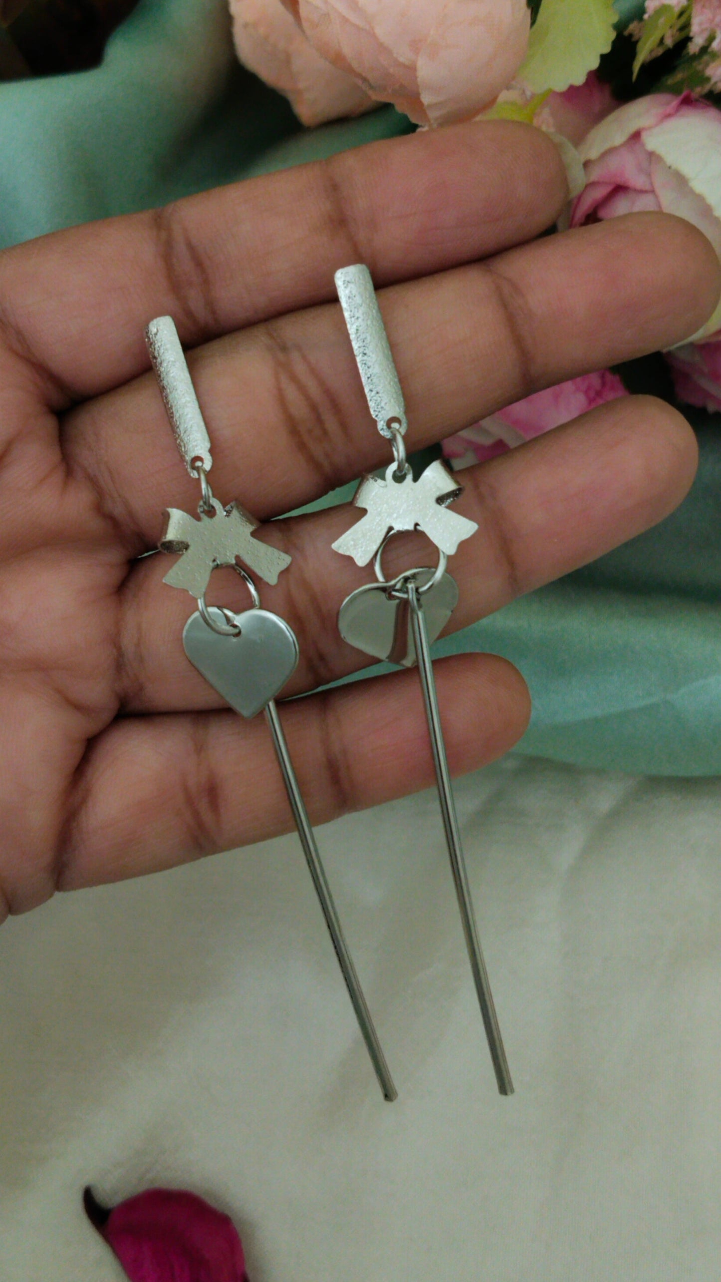 silver tone party western heart with bow earring