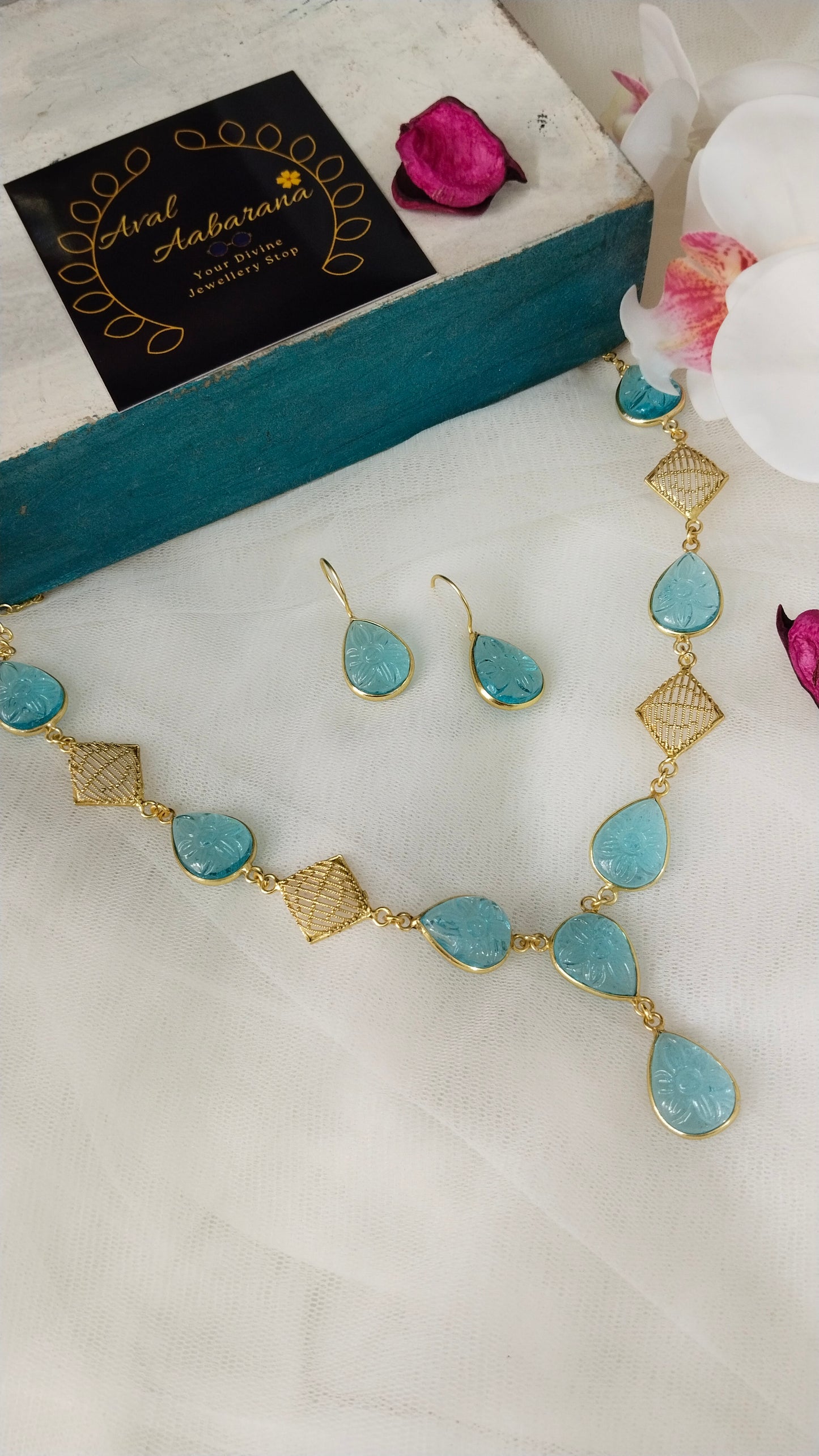 Beautifully Carved sky blue monalisa stone with self designed necklace set