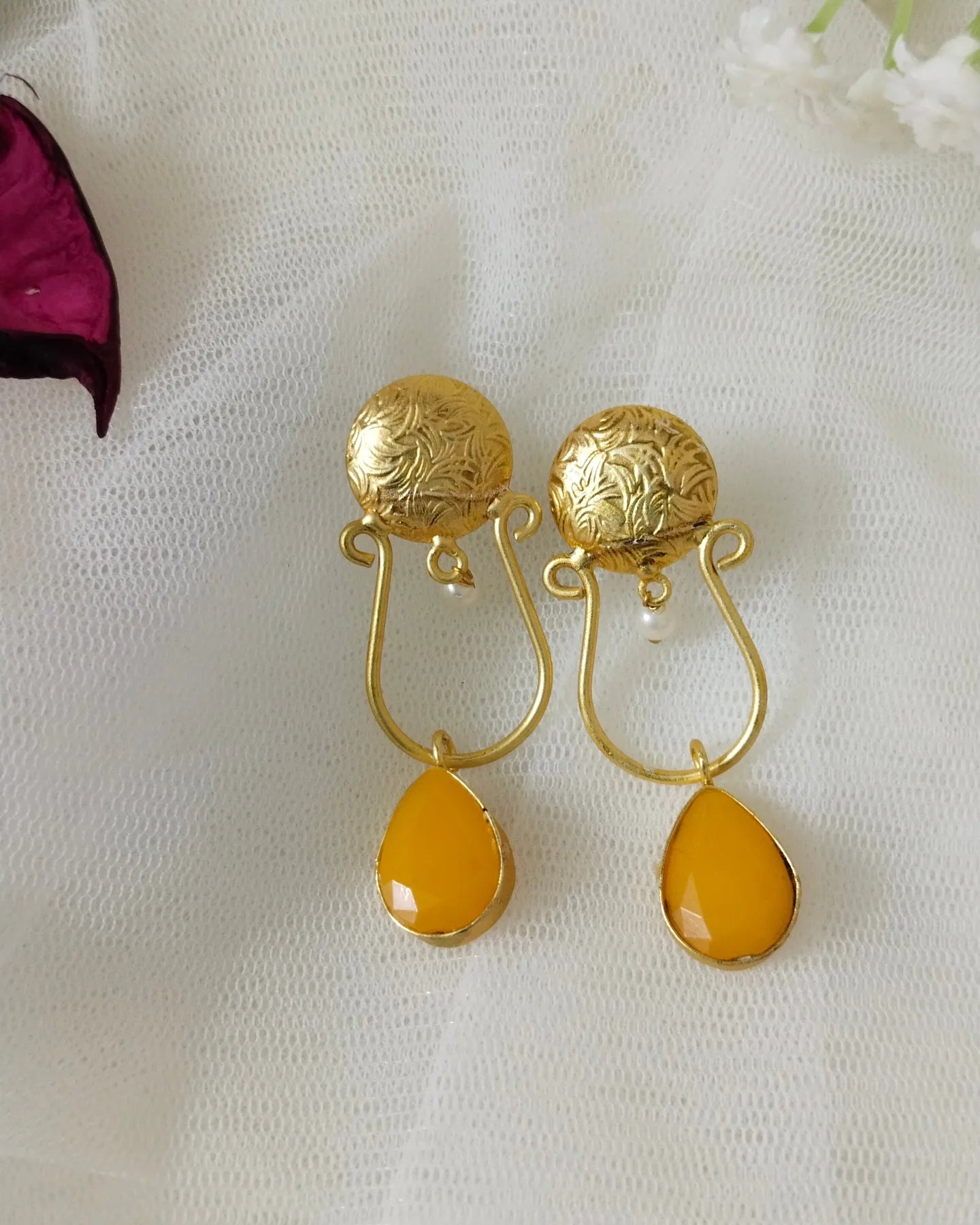 Cute brass earring with yellow stone