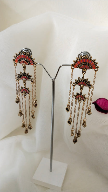 Orange enameled dangler earring