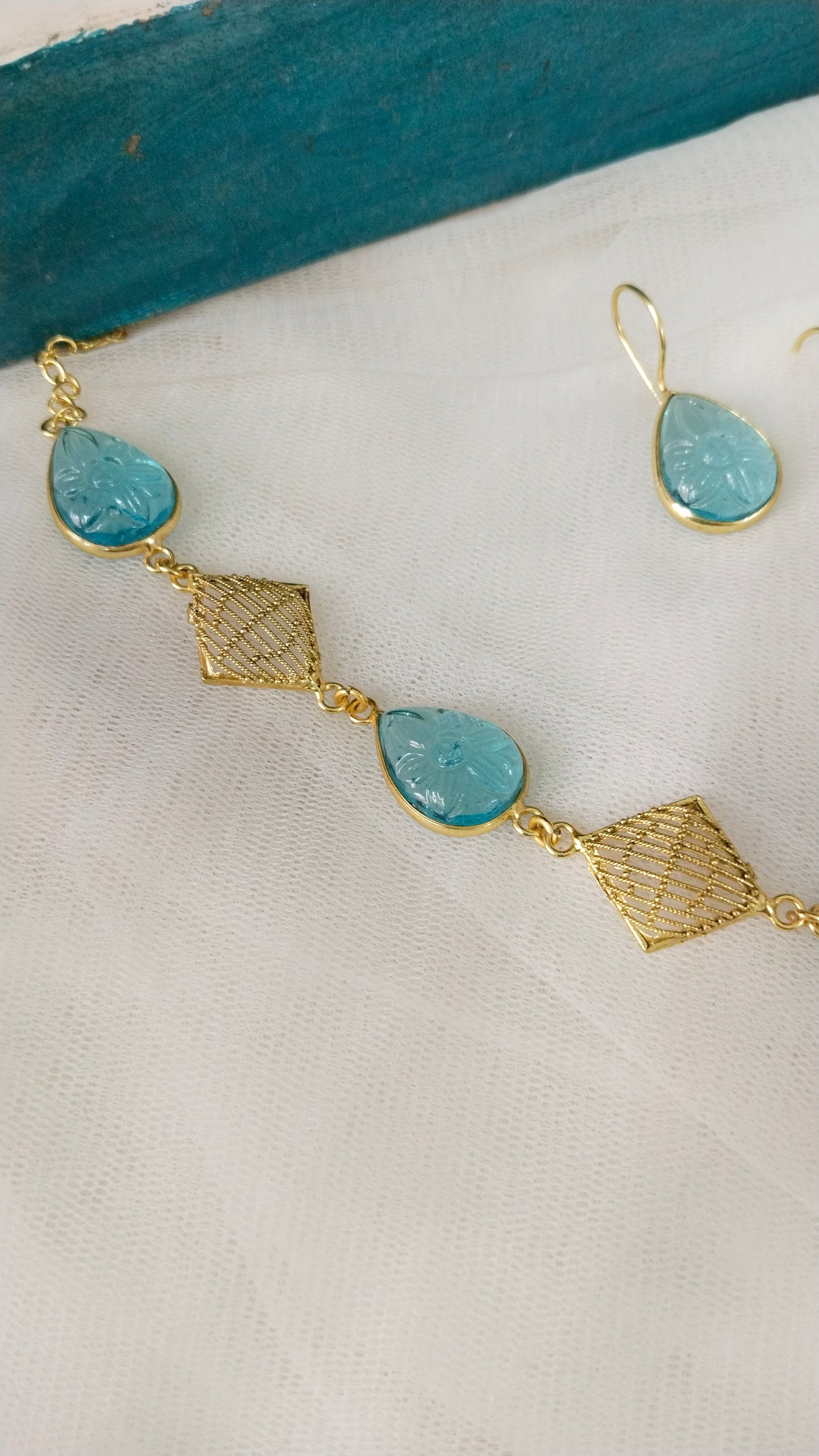 Beautifully Carved sky blue monalisa stone with self designed necklace set