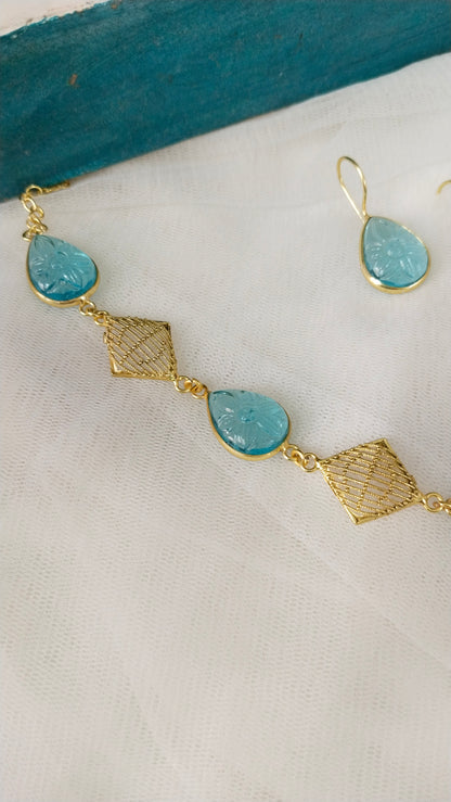 Beautifully Carved sky blue monalisa stone with self designed necklace set