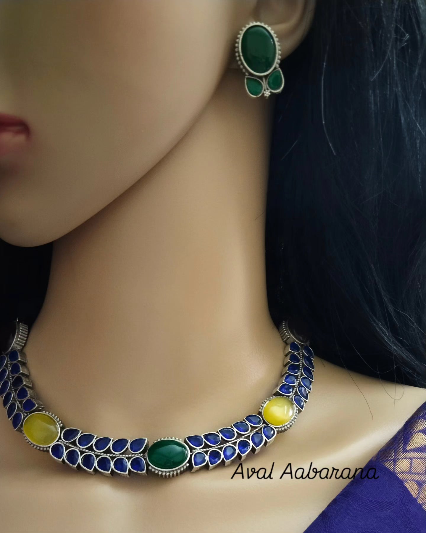 Silver replica necklace with blue stone