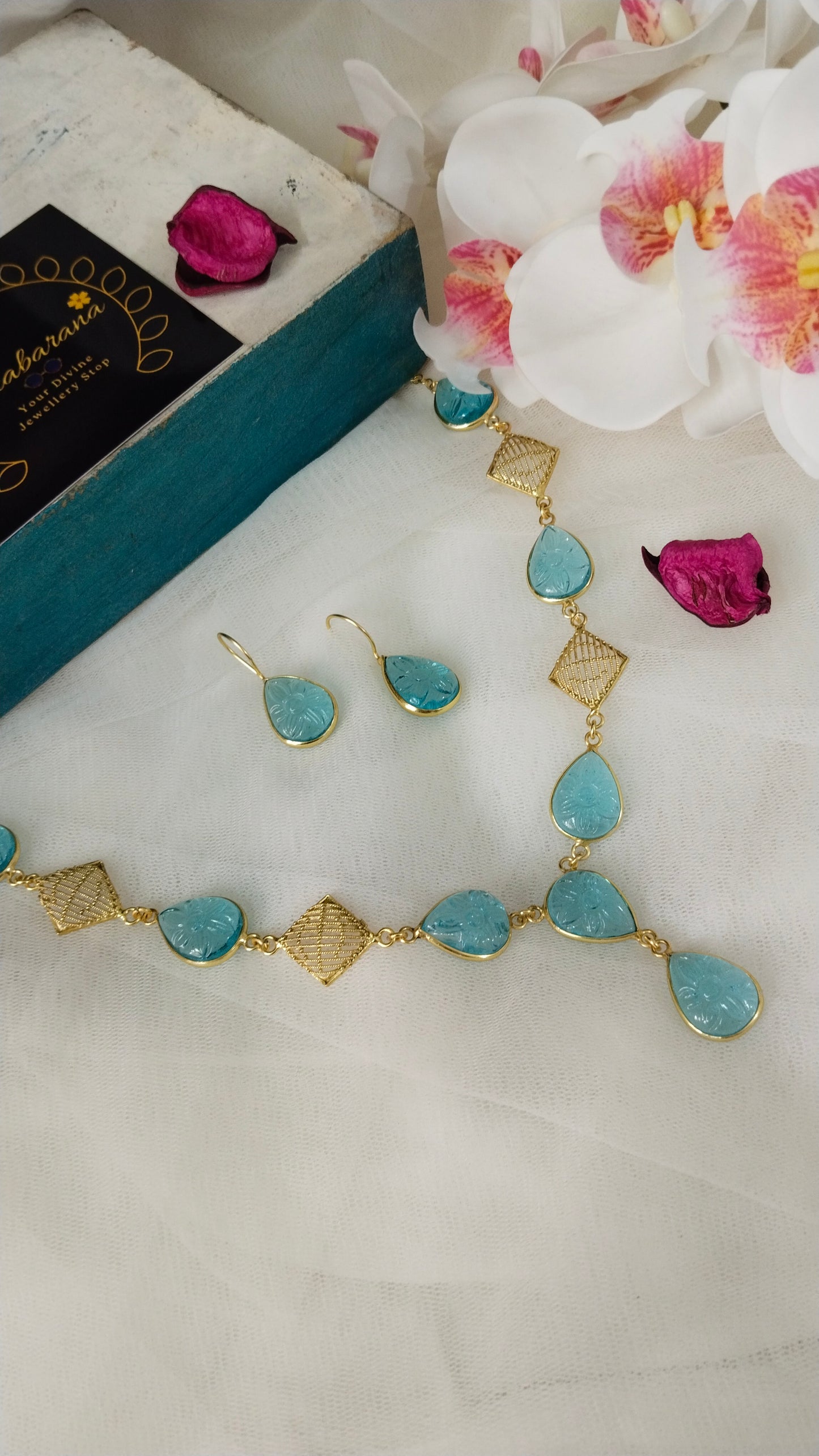 Beautifully Carved sky blue monalisa stone with self designed necklace set